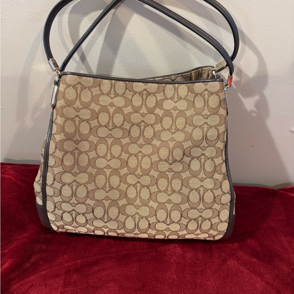 Coach Handbags - Coach Brown and Black Signature Shoulder Bag